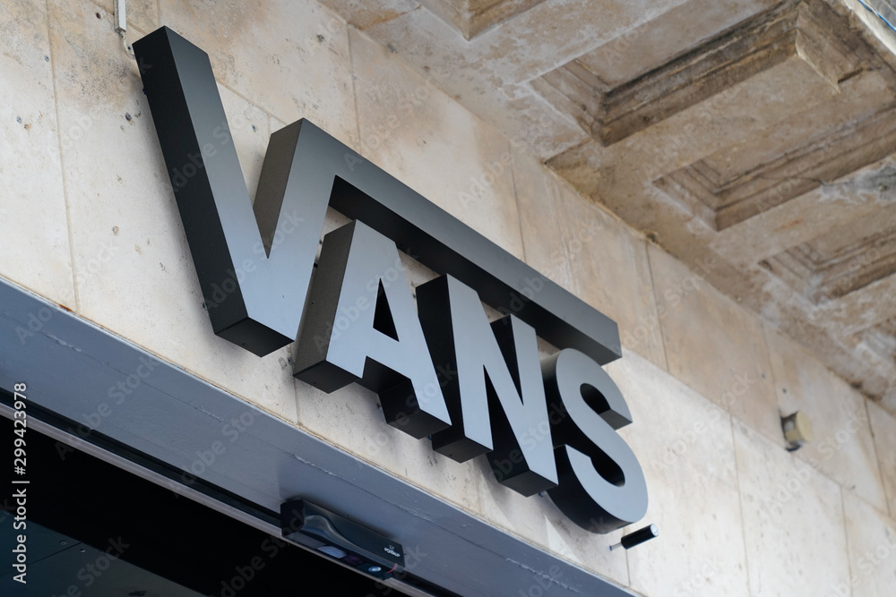 Vans logo shop sign American manufacturer store shoes based in California  Stock Photo | Adobe Stock