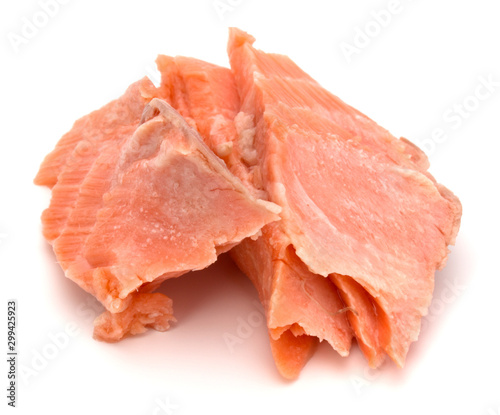 smoked salmon segments isolated over white background cutout. Prepared fish fillet fibres. .