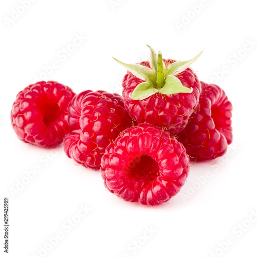 ripe raspberries isolated over white background close up .
