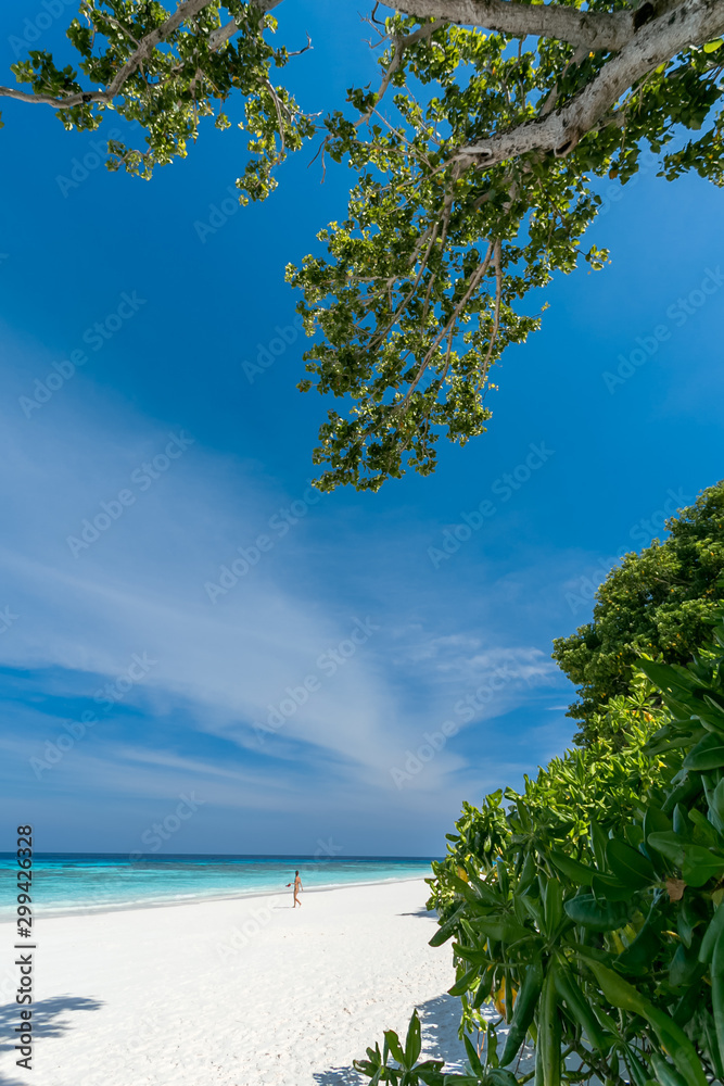 White sand beach, clear water, deep blue sky in the tropical sea of ​​Thailand.
