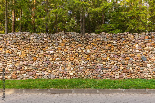 Textured stone wall bright multi-colored stones