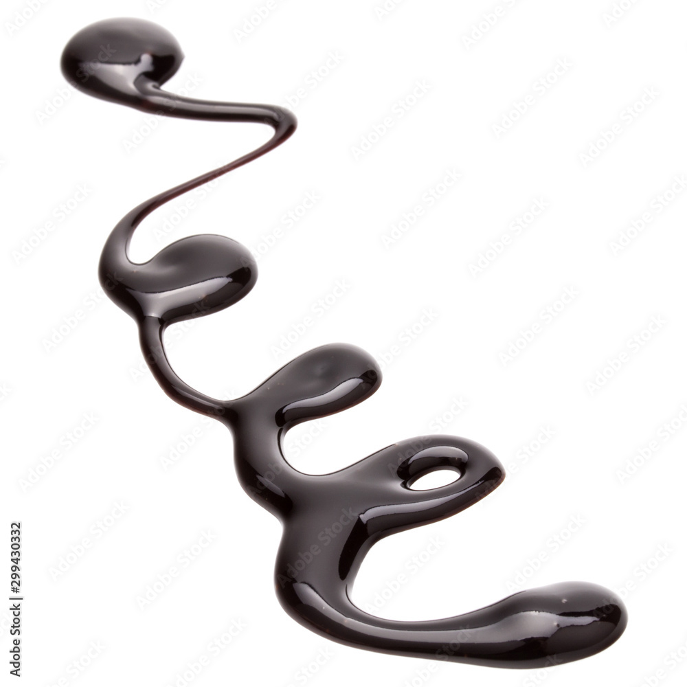 Obraz premium Chocolate syrup drop isolated on white background