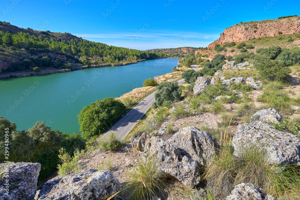 Wide angle landscape view of the Laguna La Lengua Lake in the Lagunas de Ruidera Lakes Natural Park, Albacete province, Castilla la Mancha, Spain	