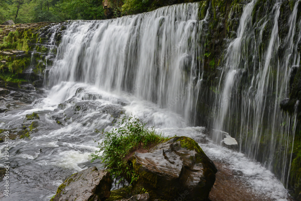 Idyllic landscape of a waterfall in Wales, United Kingdom