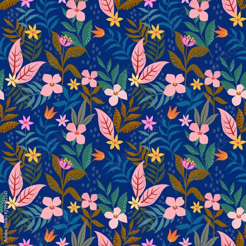  Small pink flowers flowers on blue background seamless pattern.