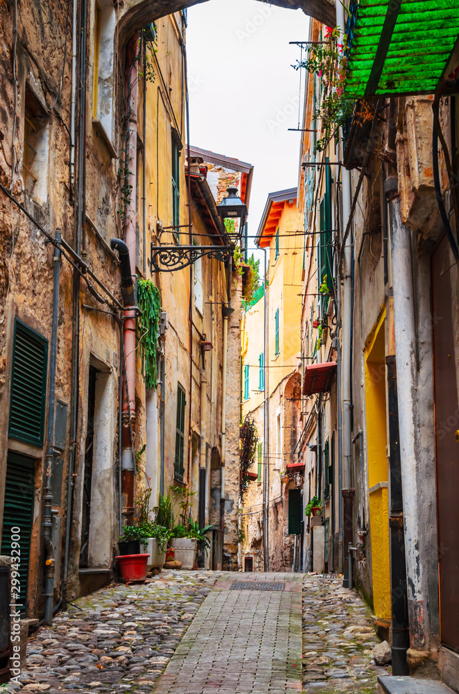 Fototapeta premium Traditional cozy street in city San Remo, Italy
