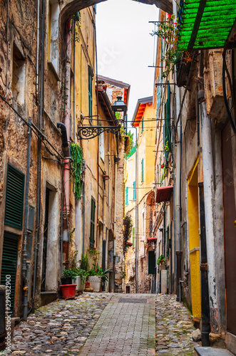 Traditional cozy street in city San Remo, Italy © Olena Zn