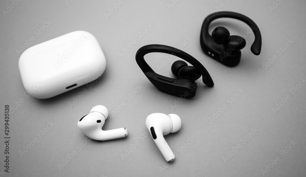 Paris, France - Oct 30, 2019: New Apple Computers AirPods Pro headphones  with Active Noise Cancellation for immersive sound with pair of Powerbeats  Pro by Dr Dre Stock Photo | Adobe Stock