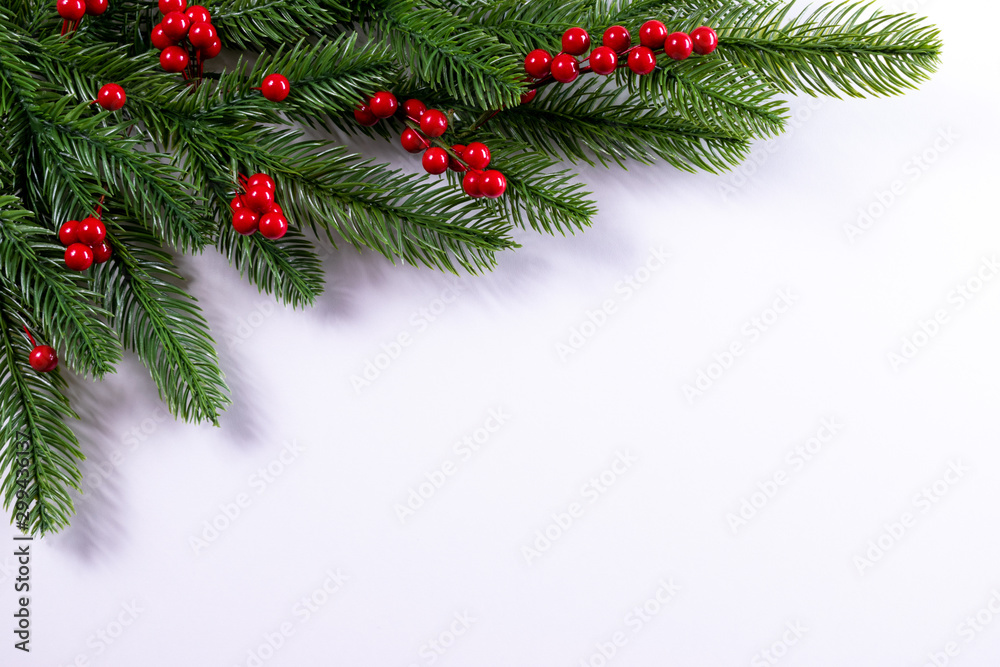 Christmas background with fir branches and holly berries. Copy space. Christmas background with fir branches and holly berries. Copy space.