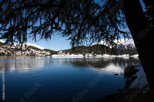 St. Moritz, Switzerand with lake and snowy mountains photo