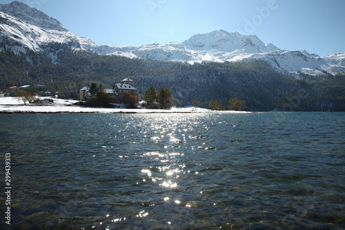 St. Moritz, Switzerand with lake and snowy mountains photo