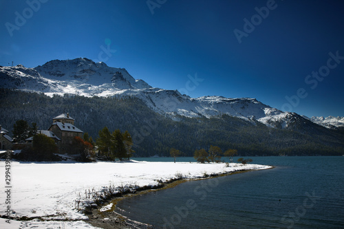 St. Moritz, Switzerand with lake and snowy mountains photo