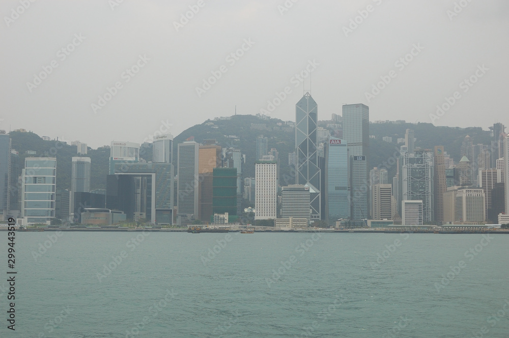 Fototapeta premium The high buildings facing the Victoria Harbour in Hong Kong