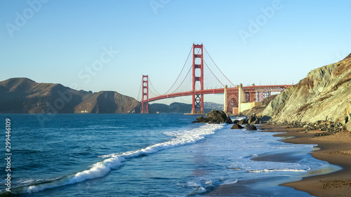 wide angle shot of golden gate bridge from marshall beach in san francisco