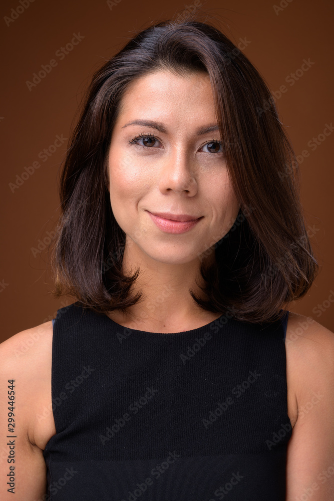Portrait of beautiful multi ethnic woman with short hair Portrait of beautiful multi ethnic woman with short hair