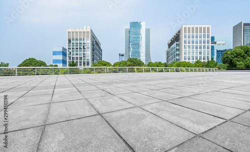 Panoramic skyline and buildings with empty square floor.