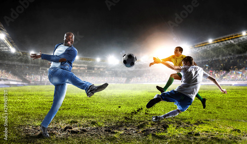 Fototapeta Naklejka Na Ścianę i Meble -  Soccer man in action with ball. Mixed media