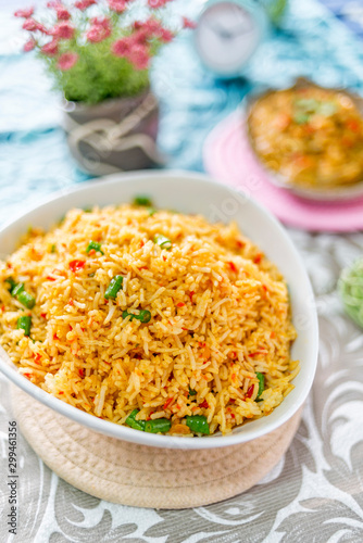 A plate of delicious home cooked fried rice which is popular in Malaysia, Indonesia, Thailand and Singapore