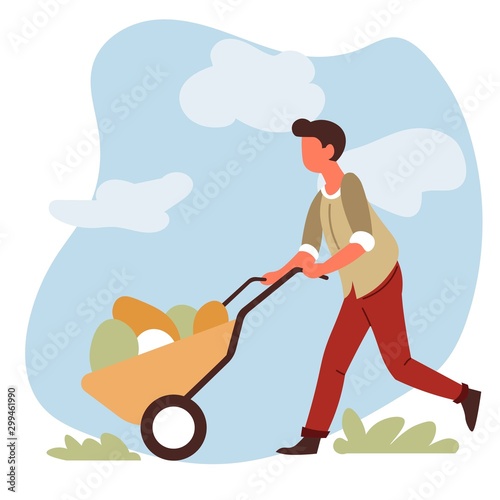 Man farmer with vegetable harvest in wheelbarrow farming and gardening