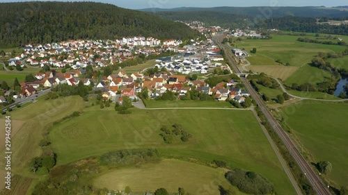 Aerial view of the city Immendingen in Germany. On a sunny day in summer. Zoom in to the town. photo