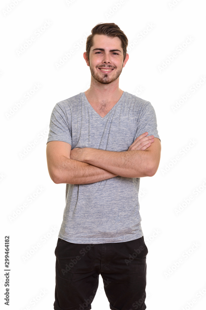 Portrait of happy young handsome bearded man smiling Portrait of happy young handsome bearded man smiling