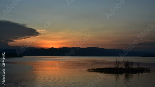 Sunset over mountains lake landscape Thailand, Time lapse.