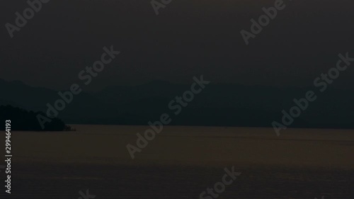 Sunset over mountains lake landscape Thailand, Time lapse.