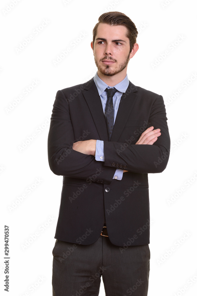 Portrait of young handsome bearded businessman in suit Portrait of young handsome bearded businessman in suit