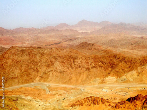 Panoramic view of the Mount Sinai from hill, a mountain in the Sinai Peninsula of Egypt, a possible location of the biblical Mount Sinai, also famous for hiking to watch sunset and sunrise scenery.  photo