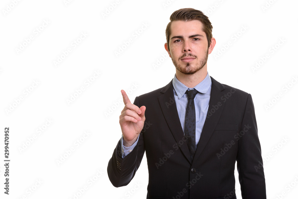 Portrait of young handsome bearded businessman in suit Portrait of young handsome bearded businessman in suit