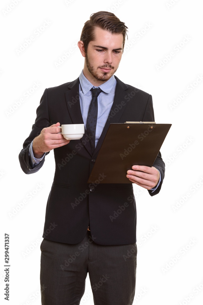 Portrait of young handsome bearded businessman in suit Portrait of young handsome bearded businessman in suit