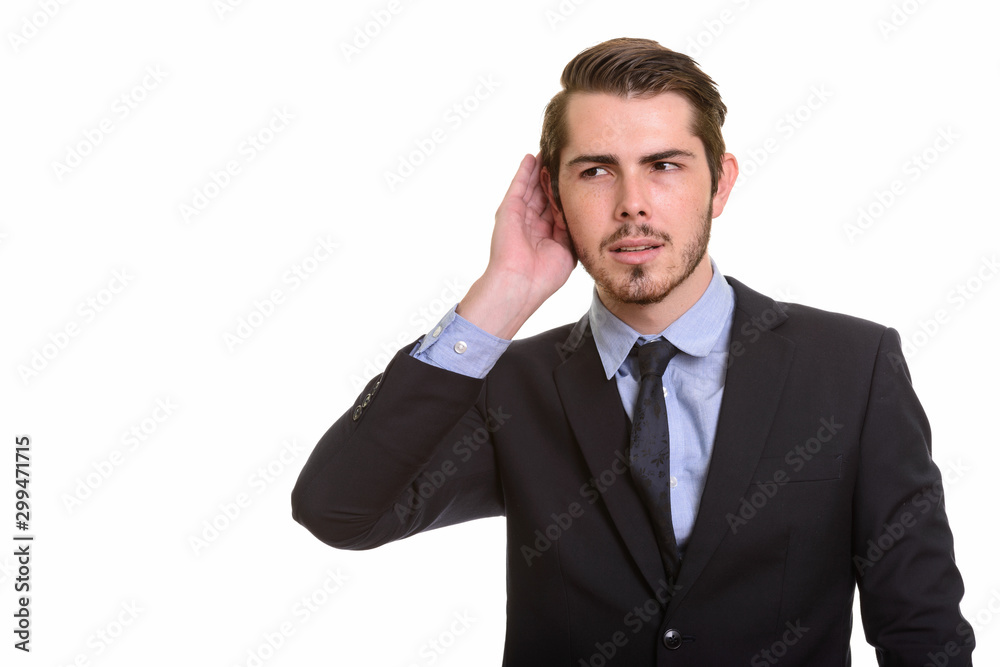 Portrait of young handsome bearded businessman in suit Portrait of young handsome bearded businessman in suit
