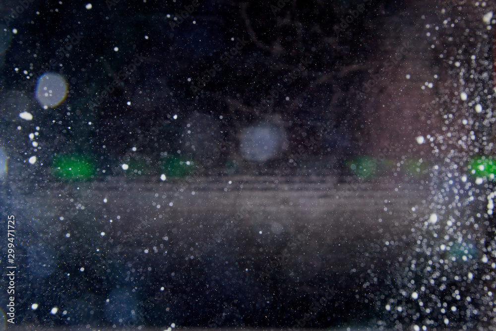 Naklejka premium Abstract dust explosion and flash with illumination on a black background