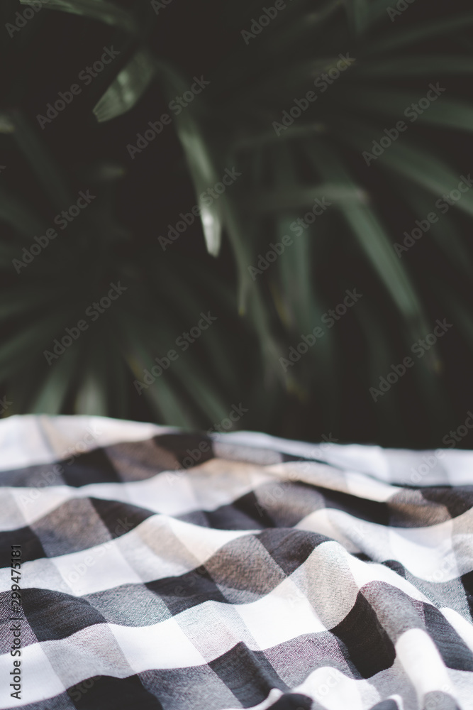 black and white table cloth with fade green leaf background for product montage