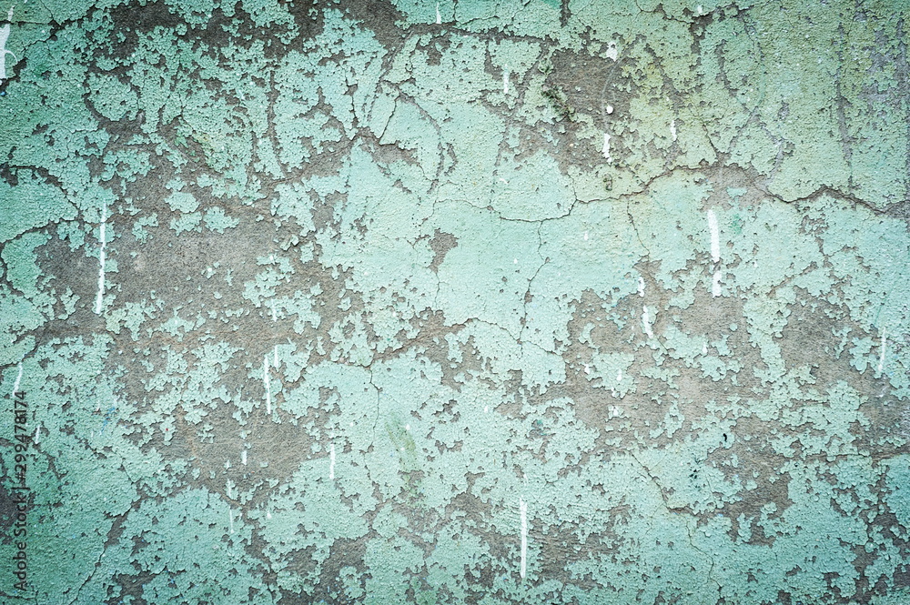 Old flaky blue painted wall, texture, closeup