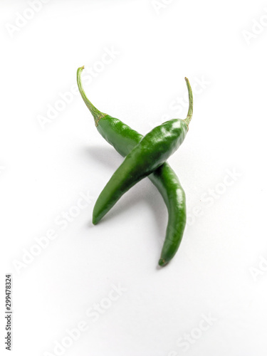 Green chilli stock images with white background.
