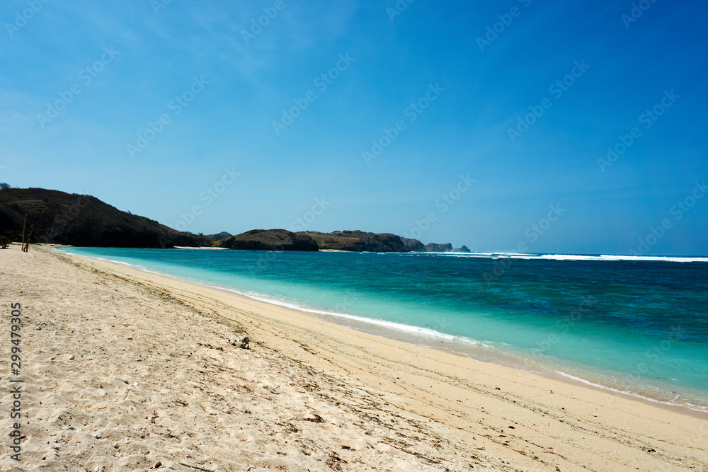 LOMBOK, INDONESIA - September.10.2019: Empty beach at kuta beach, Lombok, Indonesia. LOMBOK, INDONESIA - September.10.2019: Empty beach at kuta beach, Lombok, Indonesia.