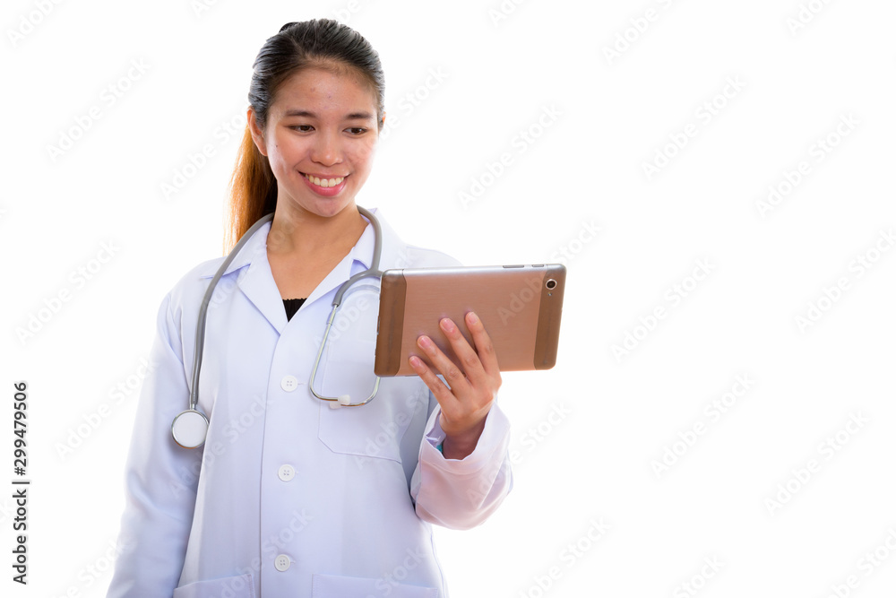 Portrait of young Asian woman doctor using digital tablet Portrait of young Asian woman doctor using digital tablet
