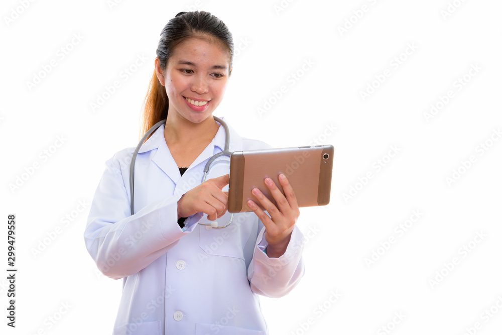 Portrait of young Asian woman doctor using digital tablet Portrait of young Asian woman doctor using digital tablet