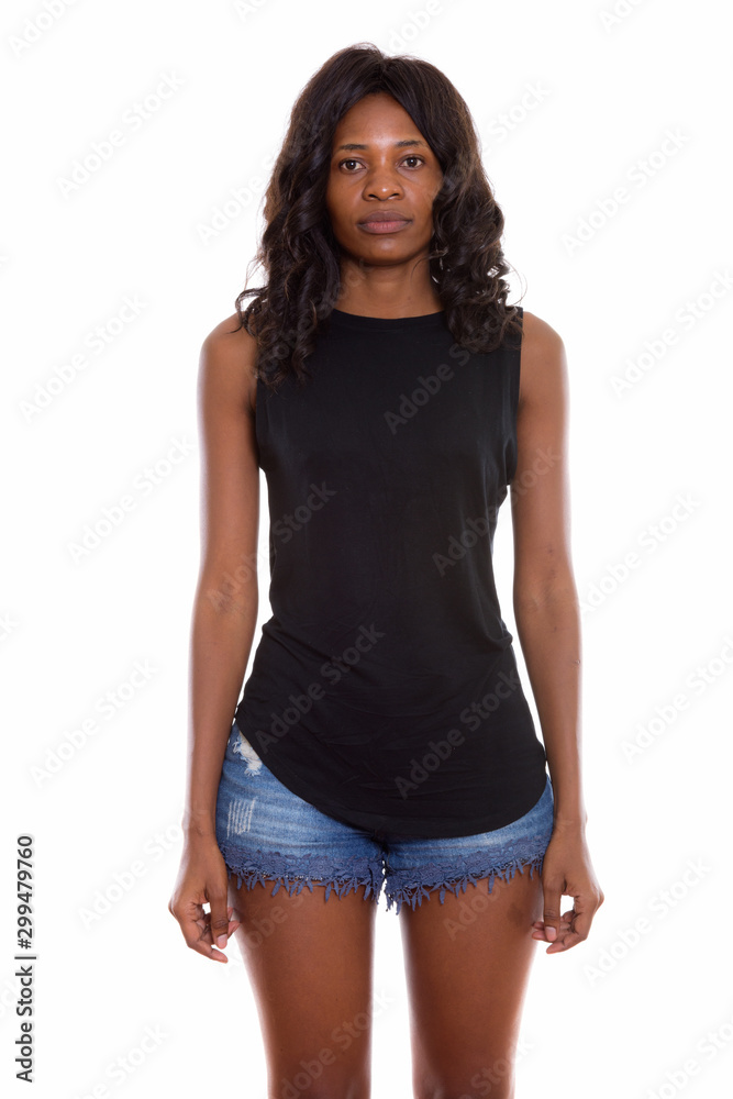 Studio shot of young beautiful African woman with wig Studio shot of young beautiful African woman with wig