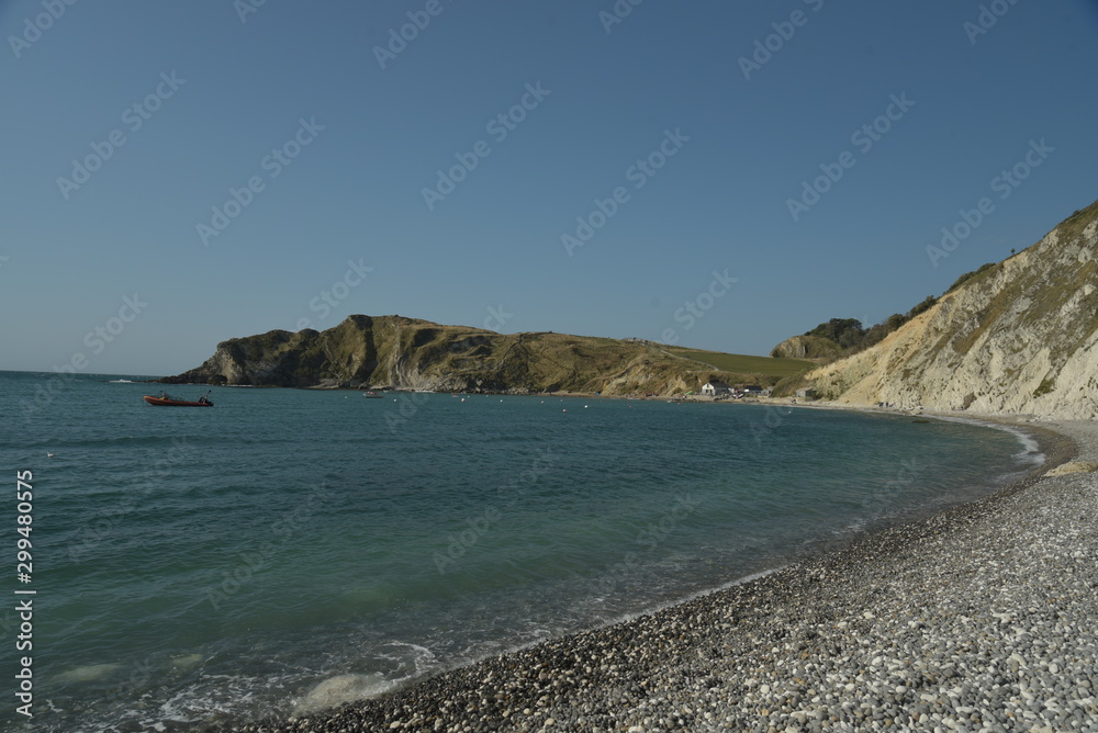 Fototapeta premium View over Lulworth Cove rock formations and strata on the Dorset coast