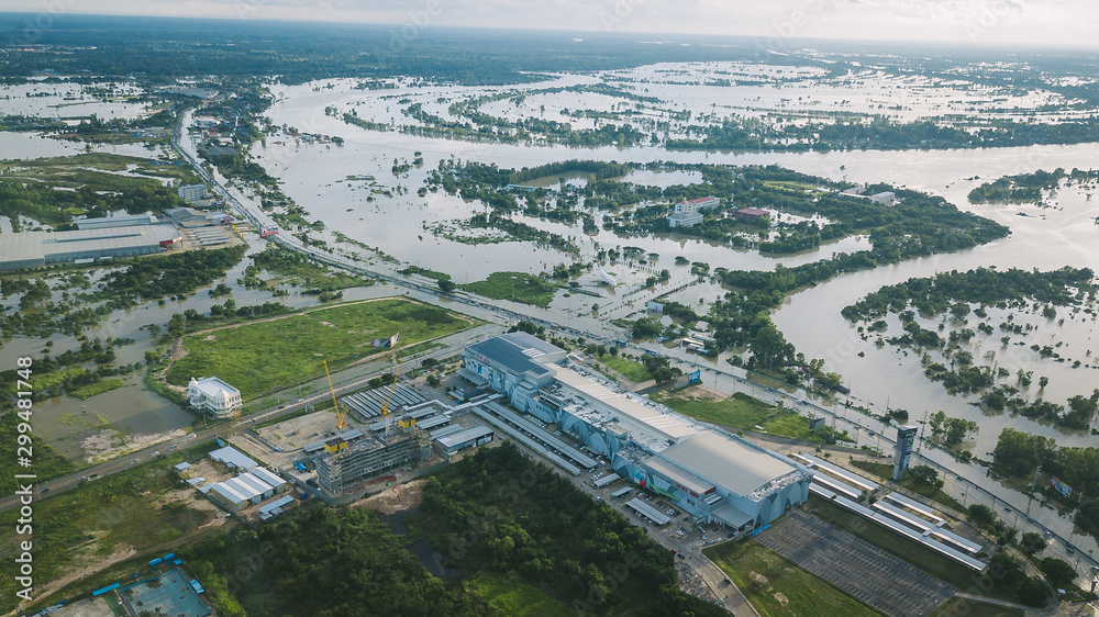 High-angle view of the Great Flood, Meng District, Ubon Ratchathani Province, Thailand, on September 10, 2019, is a photograph from real flooding. With a slight color adjustment
