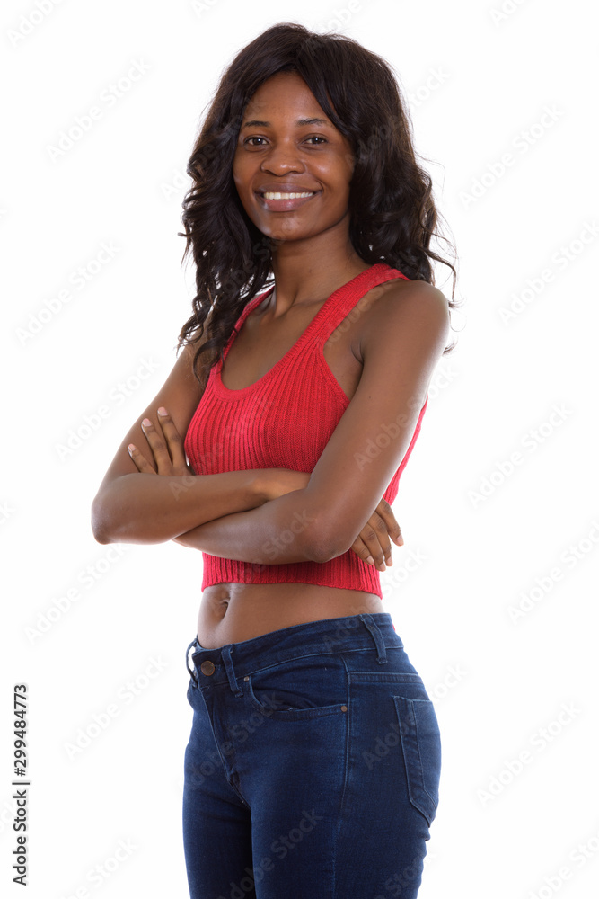 Obraz premium Studio shot of young beautiful African woman with wig