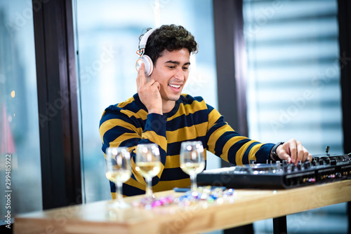 professional DJ in headphon...