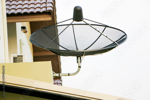 Satellite dish stuck behind the house