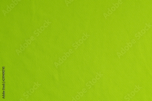 Abstraction background. Green fabric texture sports t-shirts.