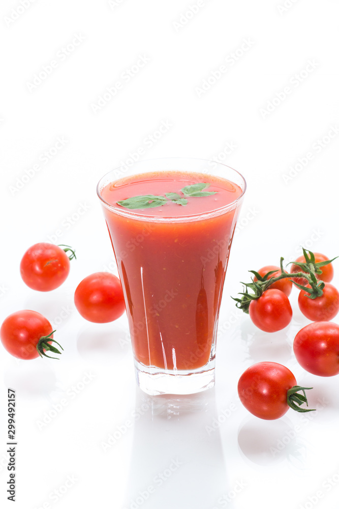 homemade tomato juice in a glass and fresh tomatoes homemade tomato juice in a glass and fresh tomatoes