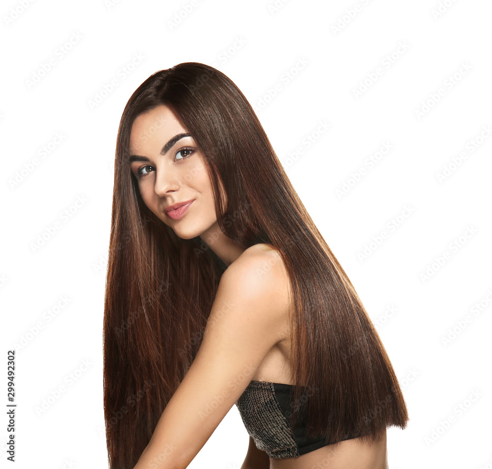 Naklejka premium Portrait of beautiful young woman with healthy long hair on white background