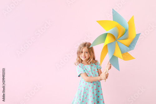 Cute little girl with paper...