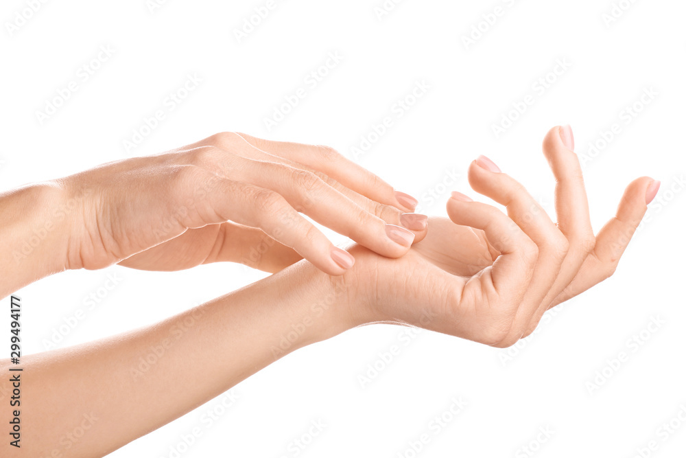 Hands of beautiful young woman on white background